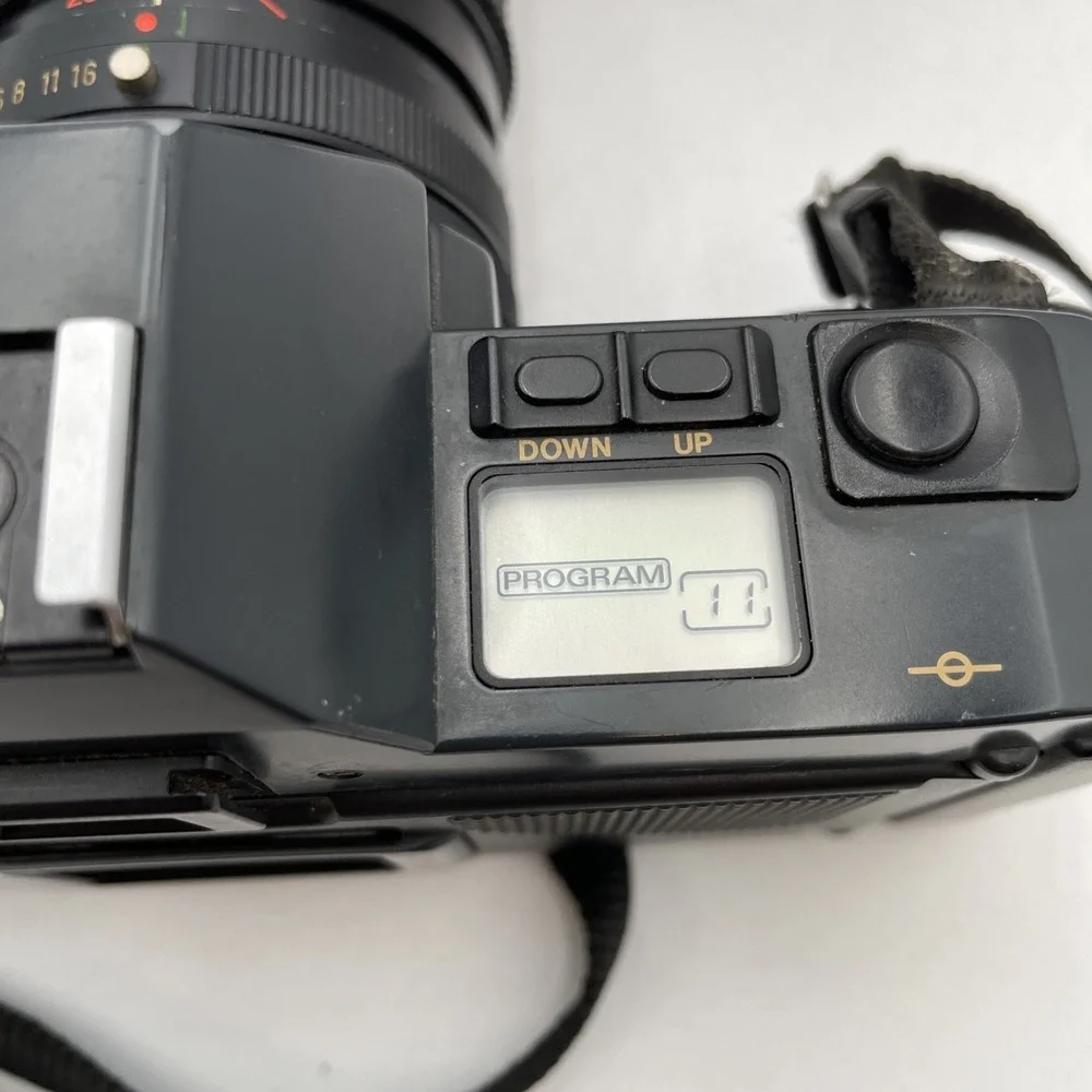 Canon T70 35mm Film Camera+Vivitar 28-85mm f/1:3.5-4.5 Lens +300EZ Flash+Case